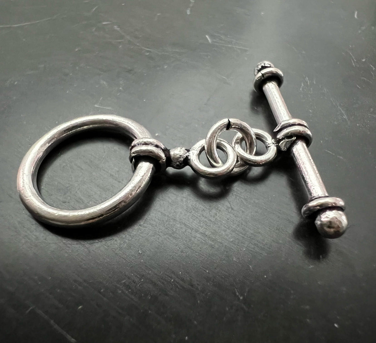 Knebel Verschluss Kupfer versilbert, geschwärzt, Ø 14,5 mm | E5