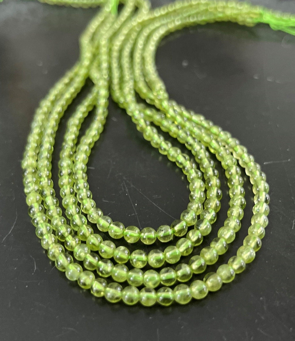 Peridot Kugeln Strang, 4 mm | S20