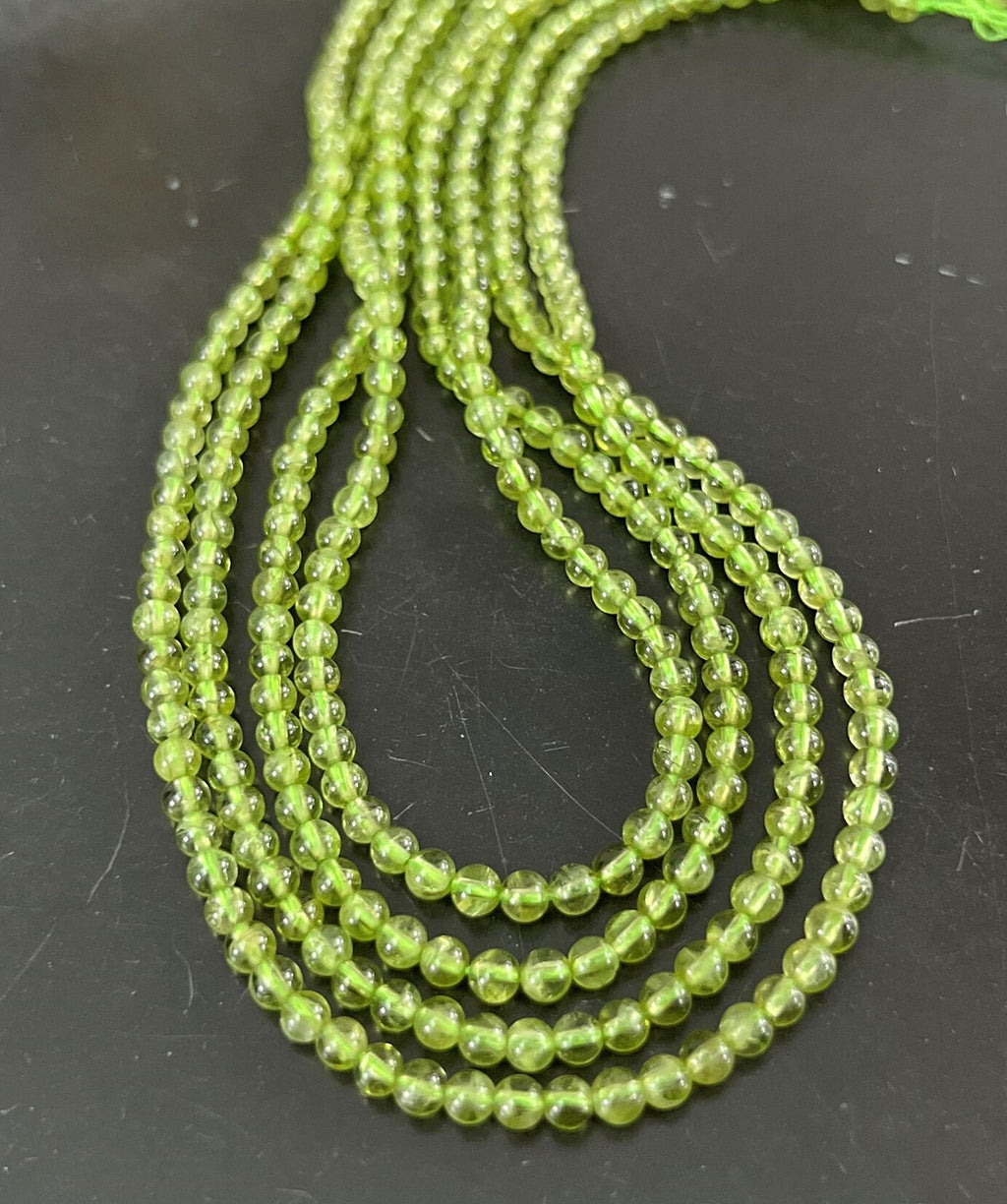 Peridot Kugeln Strang, 4 mm | S20