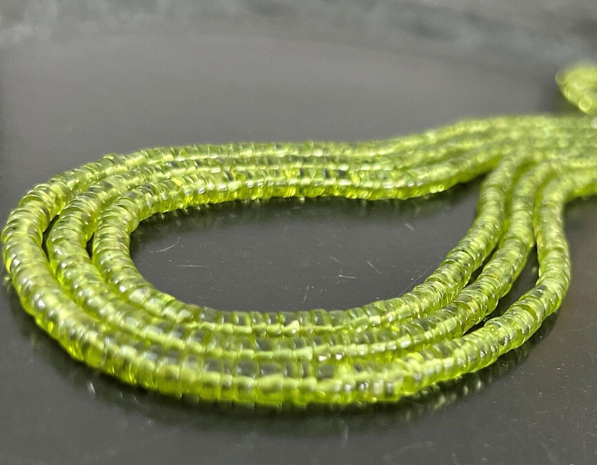 Peridot Scheiben Strang, 4,5 mm | S19