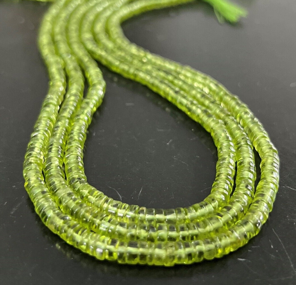 Peridot Scheiben Strang, 4,5 mm | S19