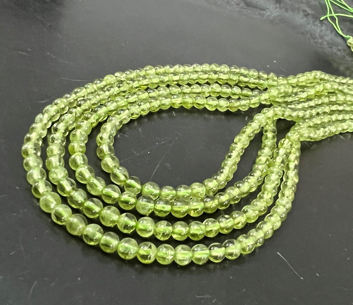 Peridot Kugeln Strang, 4 mm | S20