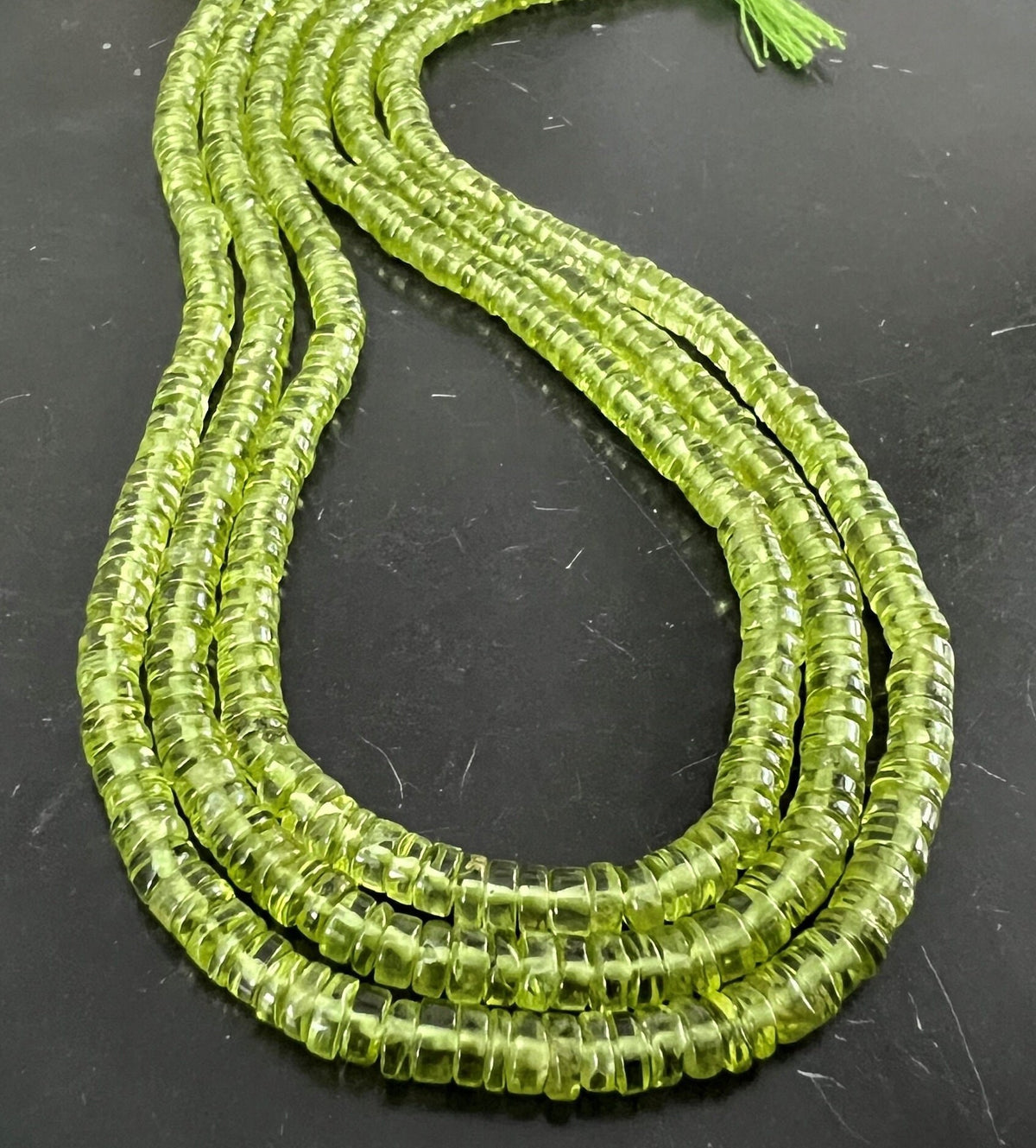 Peridot Scheiben Strang, 4,5 mm | S19