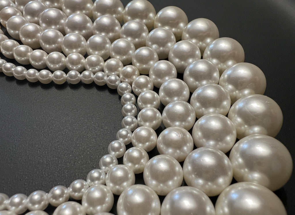 Shell pearl beads strand, white, 4 – 12 mm