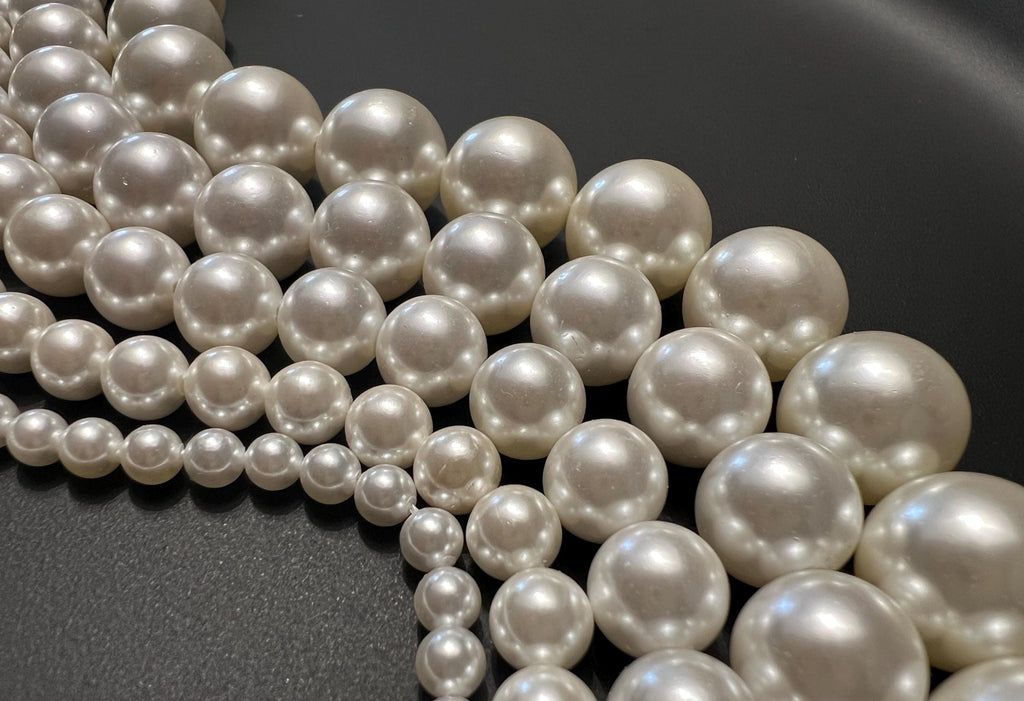 Shell pearl beads strand, white, 4 – 12 mm