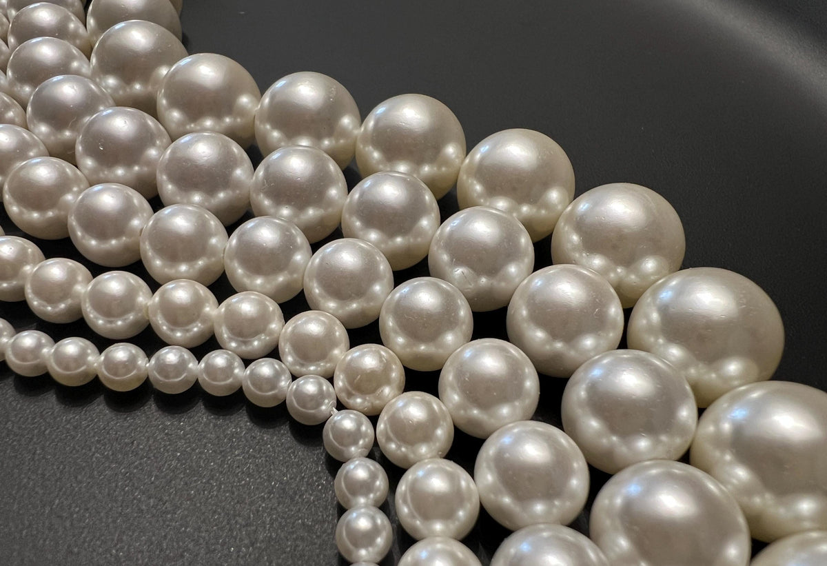 Shell pearl beads strand, white, 4 – 12 mm